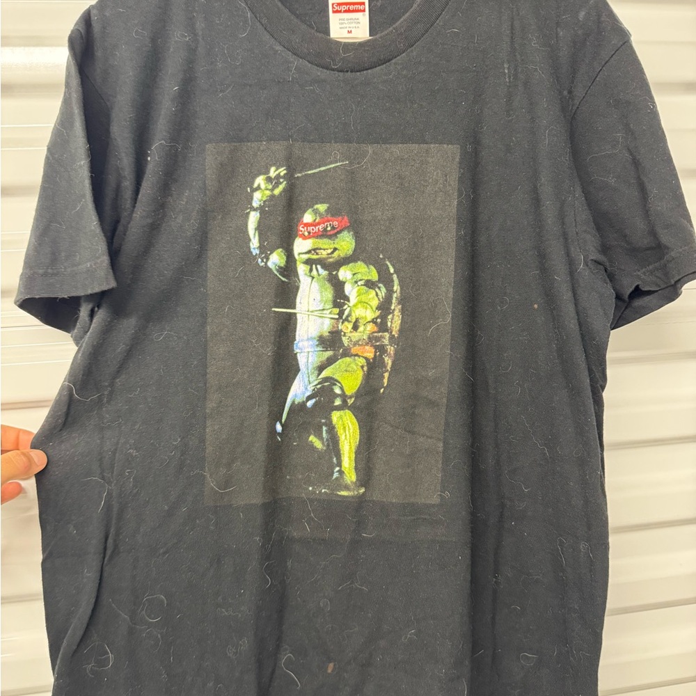 Men’s medium Supreme Raphael Tee